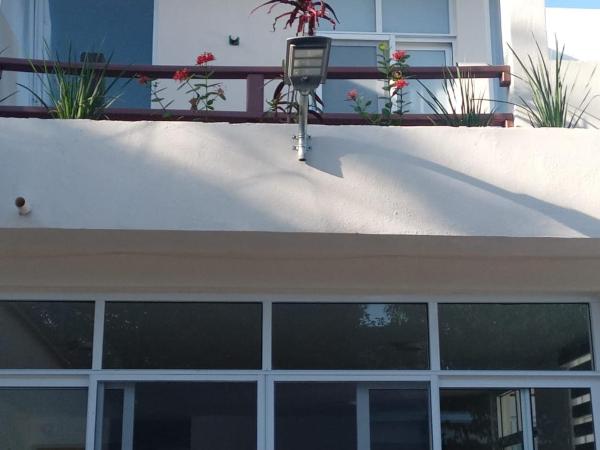 Villas Carlota Cancún : photo 6 de la chambre chambre double avec 2 lits doubles