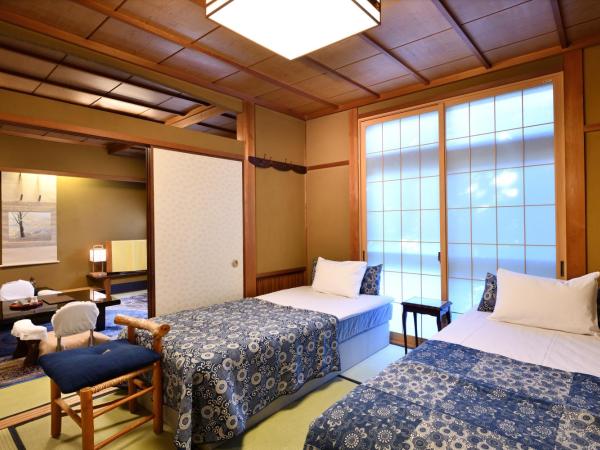 Seikoro Ryokan - Established in 1831 : photo 5 de la chambre chambre familiale deluxe