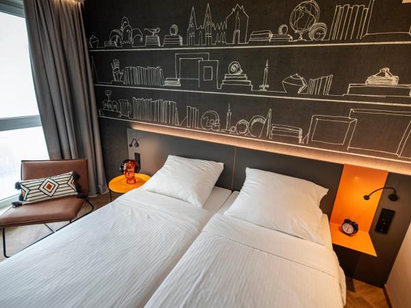 LOGINN Hotel Köln Airport : photo 7 de la chambre chambre lits jumeaux supérieure