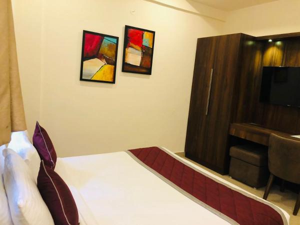 COASTAL GRAND Cassa Times - Electronic City : photo 10 de la chambre chambre deluxe