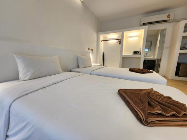 Twin Bay Resort Koh Lanta : photo 7 de la chambre chambre double ou lits jumeaux supérieure - vue sur jardin