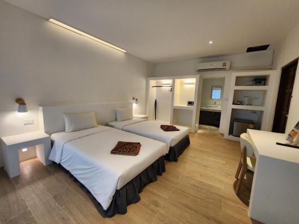 Twin Bay Resort Koh Lanta : photo 9 de la chambre chambre double ou lits jumeaux supérieure - vue sur jardin