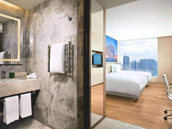 East Beijing : photo 5 de la chambre chambre lits jumeaux urbaine