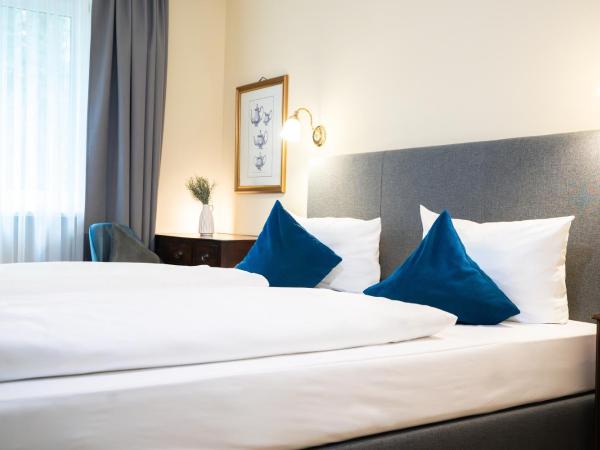 Hotel Altmünchen by Blattl : photo 2 de la chambre chambre triple classique