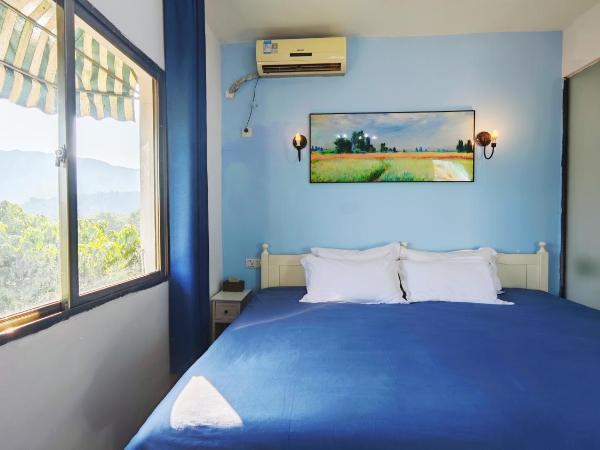 Cloud Tree Inn Yun Shu Li ,Xichong, Shenzhen : photo 2 de la chambre chambre lit king-size - vue sur montagne