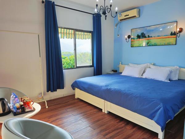 Cloud Tree Inn Yun Shu Li ,Xichong, Shenzhen : photo 4 de la chambre chambre lit king-size - vue sur montagne