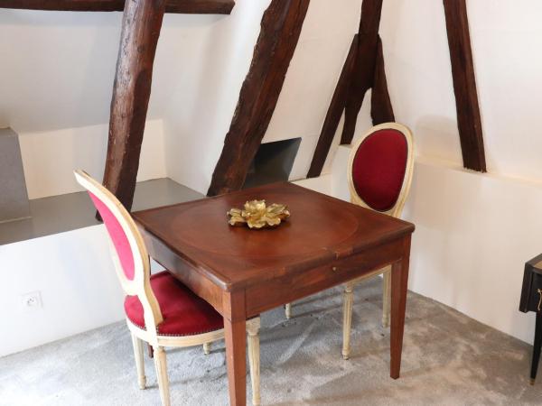 Les Charmes de Sarlat - Chambres d'Hotes : photo 10 de la chambre chambre quadruple avec salle de bains privative