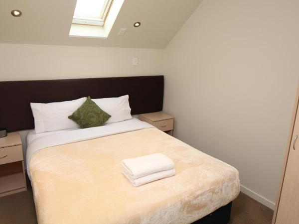 Alpha Motel : photo 10 de la chambre appartement 2 chambres avec baignoire spa