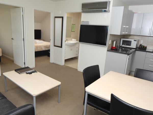 Alpha Motel : photo 7 de la chambre appartement 2 chambres avec baignoire spa