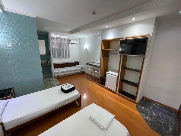 Hotel Estrela da Agua Fria : photo 2 de la chambre chambre triple exécutive