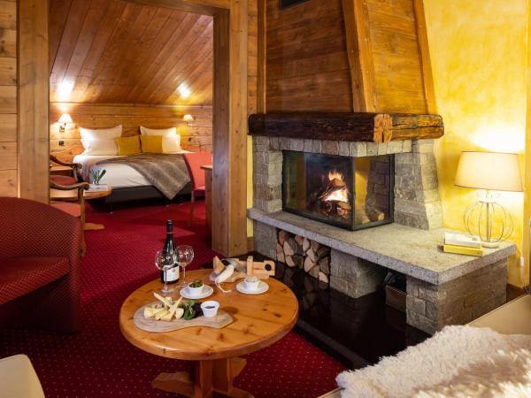 Hotel Mont Vallon : photo 2 de la chambre suite avec cheminée