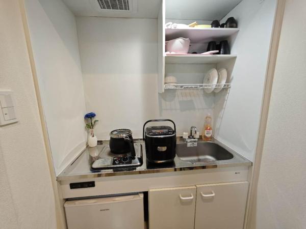 Nerima house : photo 1 de la chambre chambre double avec 2 lits doubles