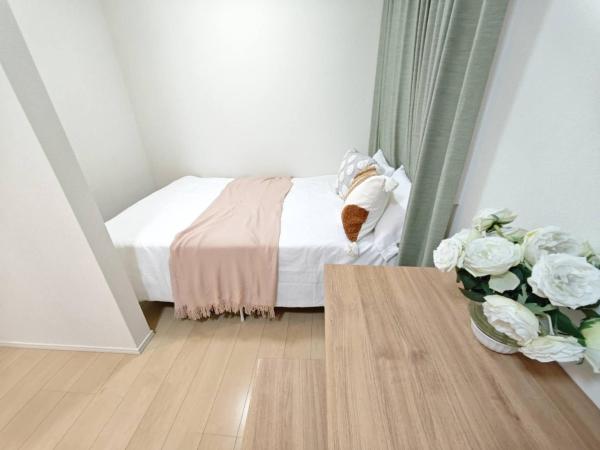 Nerima house : photo 4 de la chambre chambre double avec 2 lits doubles