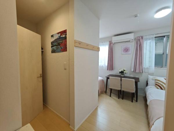 Nerima house : photo 10 de la chambre chambre double avec 2 lits doubles