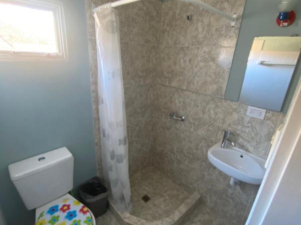 Aguilar House Hostel B&B : photo 1 de la chambre lit simple dans dortoir mixte