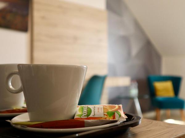 Christina Residence : photo 2 de la chambre chambre deluxe double ou lits jumeaux