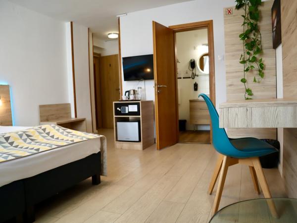 Christina Residence : photo 7 de la chambre chambre triple exécutive