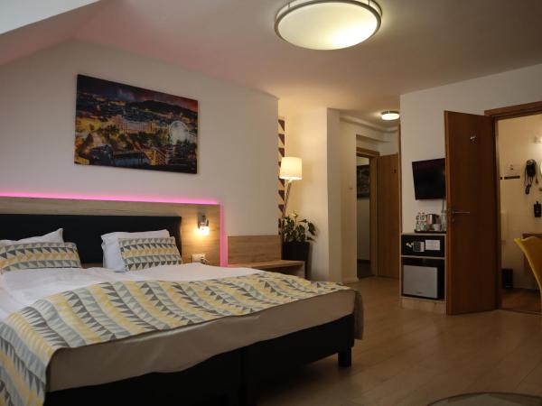 Christina Residence : photo 8 de la chambre chambre triple exécutive