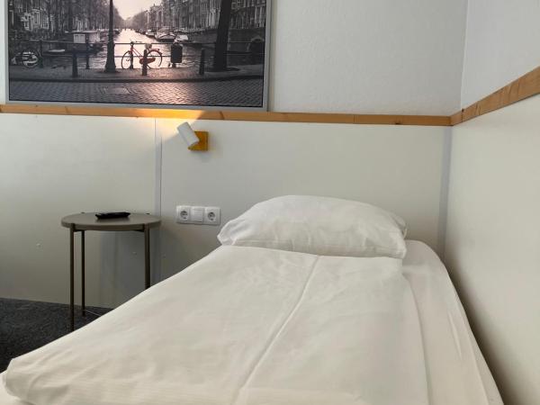 Hotel Schwarzer Bär : photo 1 de la chambre chambre triple