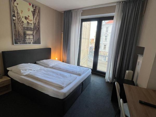 Hotel Schwarzer Bär : photo 3 de la chambre chambre lits jumeaux