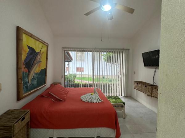 HAB PLANTA BAJA HOTEL TSORO 2 Adultos 1 menor IXTAPA WIFI GRATIS : photo 4 de la chambre chambre double deluxe