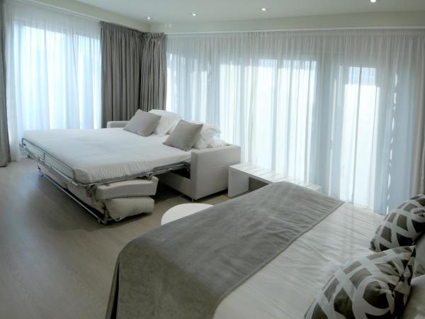 Serennia Exclusive Rooms : photo 9 de la chambre suite avec baignoire spa - vue sur ville 