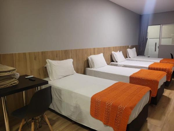 Califórnia Suítes : photo 4 de la chambre chambre quadruple deluxe