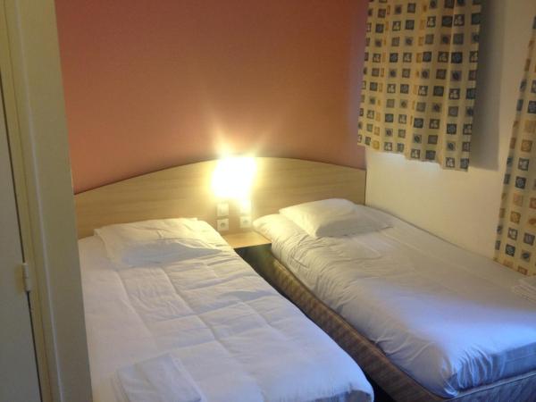 Cesar Hotel : photo 1 de la chambre chambre lits jumeaux