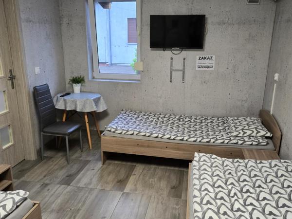 Hostel Kandulski : photo 1 de la chambre chambre triple avec salle de bains privative
