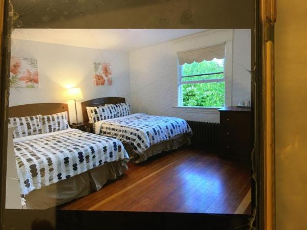 Linda guesthouse : photo 1 de la chambre chambre double ou lits jumeaux avec salle de bains privative