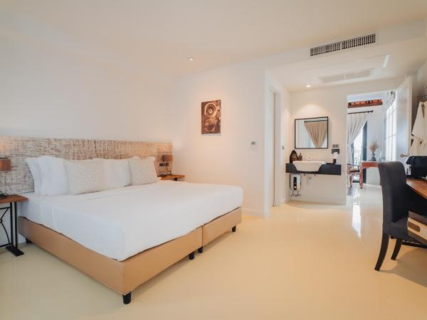 Xinlor House - Phuket Old Town : photo 1 de la chambre suite avec jacuzzi