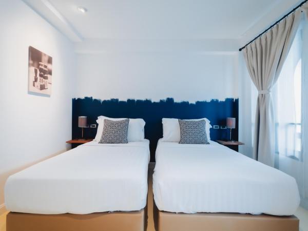 Xinlor House - Phuket Old Town : photo 2 de la chambre chambre lits jumeaux deluxe