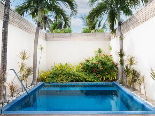 Kurumba Maldives : photo 4 de la chambre villa avec piscine et jardin