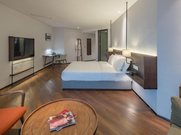 Wuyu Hotel - Chongqing Jiangbei Airport : photo 1 de la chambre chambre double deluxe avec baignoire