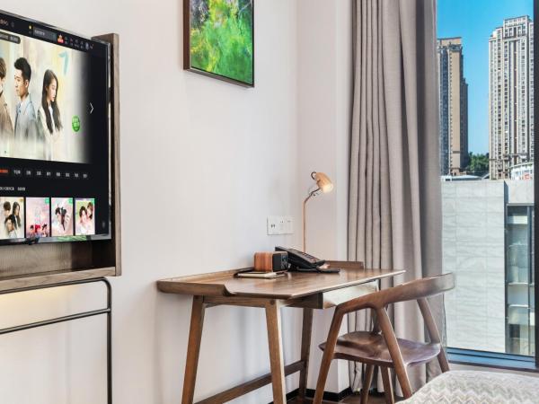 Wuyu Hotel - Chongqing Jiangbei Airport : photo 3 de la chambre chambre double deluxe avec balcon