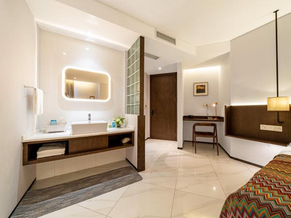 Wuyu Hotel - Chongqing Jiangbei Airport : photo 10 de la chambre chambre double standard