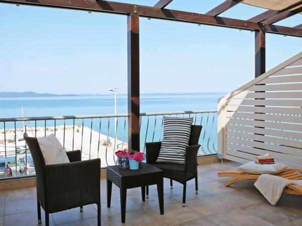 Hotel Delfin : photo 1 de la chambre chambre triple supérieure - vue sur mer