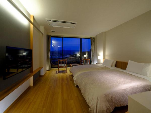 Inasayama Kanko Hotel : photo 1 de la chambre chambre lits jumeaux supérieure - vue sur mer