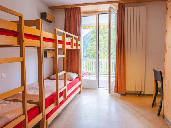 Davos Youth Hostel : photo 1 de la chambre chambre quadruple avec balcon