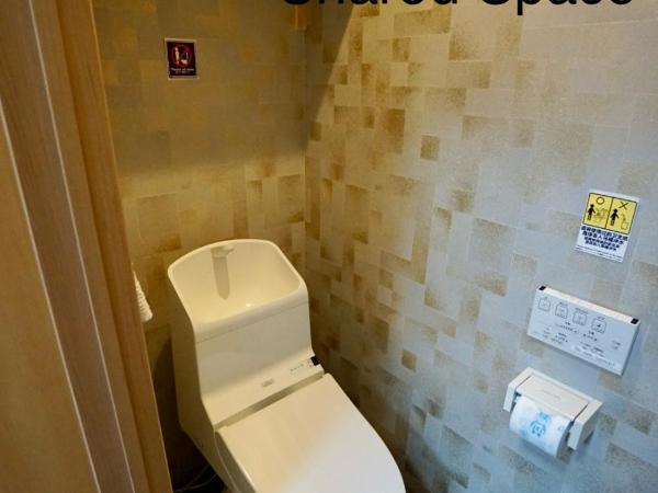 Villa Kyoto Saiin : photo 1 de la chambre chambre lits jumeaux avec matelas futon et salle de bains commune