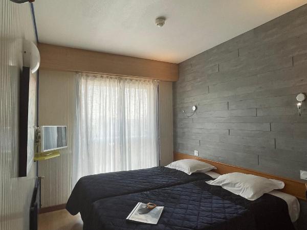 Hotel Arcantis Le Voltaire : photo 1 de la chambre chambre lits jumeaux