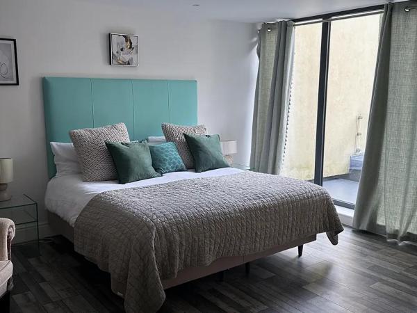 Beachcliff Rooms & Apartments : photo 5 de la chambre suite deluxe avec lit king-size