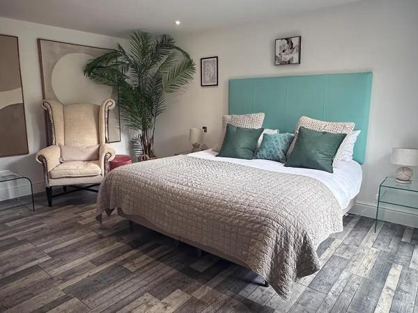 Beachcliff Rooms & Apartments : photo 3 de la chambre suite deluxe avec lit king-size