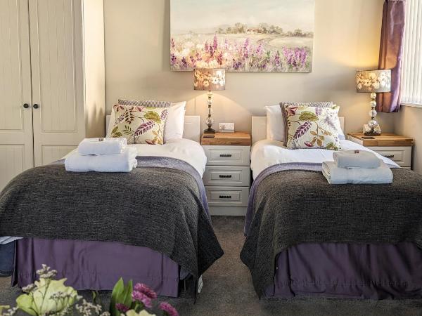 Alexander Lodge Guest House : photo 7 de la chambre chambre deluxe double ou lits jumeaux