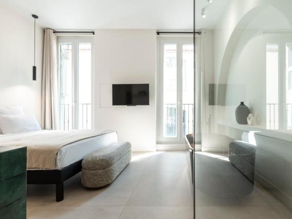 Mouchki : photo 7 de la chambre chambre double deluxe avec baignoire