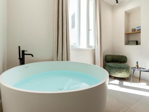 Mouchki : photo 1 de la chambre suite lit queen-size deluxe