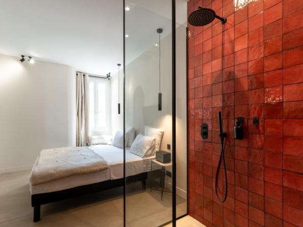 Mouchki : photo 2 de la chambre chambre double deluxe avec baignoire