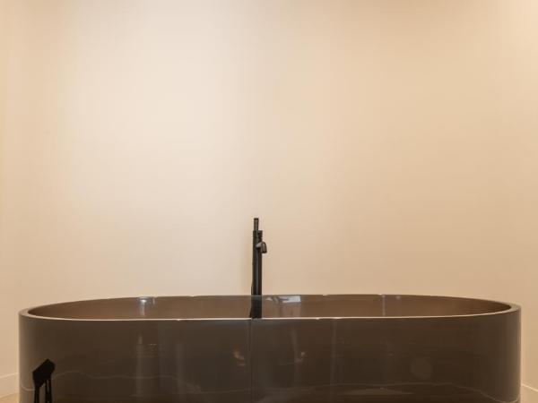 Mouchki : photo 8 de la chambre chambre double deluxe avec baignoire