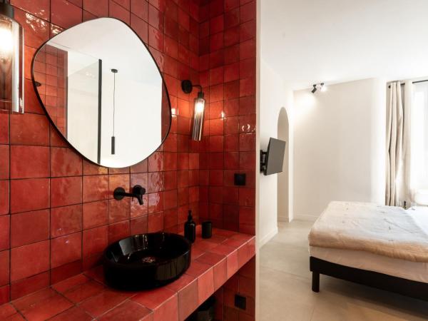 Mouchki : photo 9 de la chambre chambre double deluxe avec baignoire