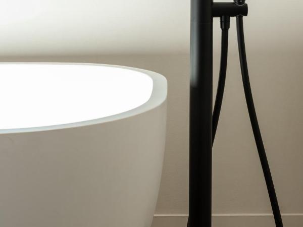 Mouchki : photo 10 de la chambre chambre double deluxe avec baignoire